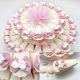 TORTA DI BOMBONIERE CON FIOCCHETTI ROSA E GESSO CICOGNA CON FAGOTTO BOMBONIERE NASCITA ORIGINALI BIMBA