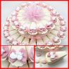 TORTA DI BOMBONIERE CON FIOCCHETTI ROSA E GESSO CICOGNA CON FAGOTTO BOMBONIERE NASCITA ORIGINALI BIMBA