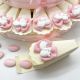 TORTA DI BOMBONIERE CON FIOCCHETTI ROSA E GESSO CICOGNA CON FAGOTTO BOMBONIERE NASCITA ORIGINALI BIMBA