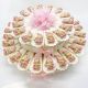 TORTA ROSA 15/25/40 FETTE: UNA DELIZIOSA BOMBONIERA CON MAGNETI JOLLY BAMBINA TAMBURELLO