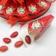 TORTA DI BOMBONIERE CON APPLICAZIONE LAUREA IN LEGNO MAPPAMONDO CON TOCCO ROSSO