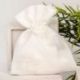 SACCHETTO PORTACONFETTI BIANCO CON FIORELLINI IN TESSUTO CONFETTATA COMUNIONE