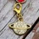 PENDAGLIO A FORMA DI PIANETA SATURNO COLOR ORO CON STRASS
