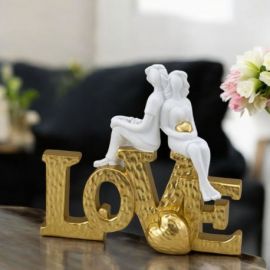 SCRITTA LOVE ORO CON COPPIA LEI+LEI CON CUORE IN MANO