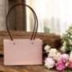 BUSTA RETTANGOLARE ROSA IMPERMEABILE CON MANICI PER OGNI OCCASIONE