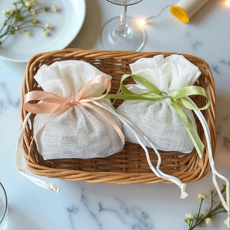 SACCHETTINO TONDO IN JUTA BIANCA CON CHIUSURA A TIRANTE