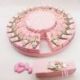 TORTA DI BOMBONIERE ROSA CON ORSETTI IN MONGOLFIERA NASCITA BIMBA