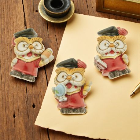 GUFETTI IN RESINA ECONOMICI BOMBONIERE LAUREA CALAMITE