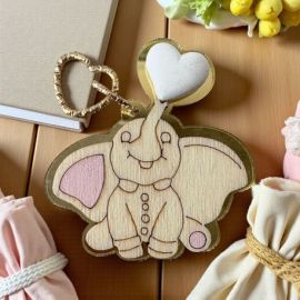 APPLICAZIONE ELEFANTINO ROSA CON CIONDOLO CUORE PER BOMBONIERE BIMBA