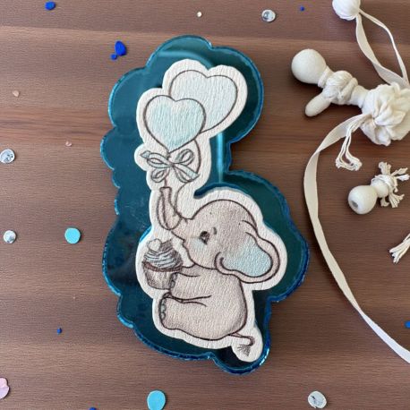 CALAMITA ELEFANTINO CELESTE PER BOMBONIERE NASCITA E BATTESIMO