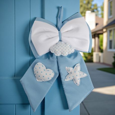 FIOCCO NASCITA BIMBO IN TESSUTO CELESTE E BIANCO PER DECORAZIONE NASCITA