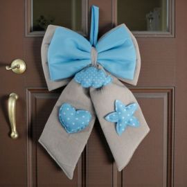 FIOCCO NASCITA BIMBO IN TESSUTO BEIGE E CELESTE DECORAZIONE NASCITA