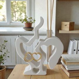 PROFUMATORE VOLTI STILIZZATI CON CUORI: BOMBONIERA PER NOZZE