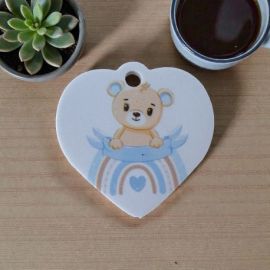 CIONDOLO CUORE CON ORSETTO CELESTE PER BOMBONIERE NASCITA E BATTESIMO