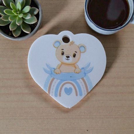 CIONDOLO CUORE CON ORSETTO CELESTE PER BOMBONIERE NASCITA E BATTESIMO