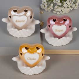 LAMPADA LED A CUORE SU MANI UNITE, CON PAROLE AMORE, GIOIA E SOGNI