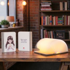 LIBRO LUMINOSO PER PRIMA COMUNIONE CON BIMBA E CALICE BOMBONIERA SOLIDALE CUOREMATTO