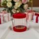 SCATOLA TONDA TRASPARENTE CON BASE E COPERCHIO ROSSI PER BOMBONIERE