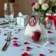 BORSETTA IN PLEXIGLASS CON CERCHIO ROSSO E ROSA SAPONATA PERSONALIZZABILE PER EVENTI