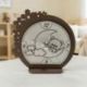 OROLOGIO ORSETTO SULLA LUNA CON FIORELLINI INTAGLIATI BATTESIMO